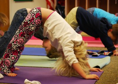 Toddlers Doing Yoga Poses on Mats